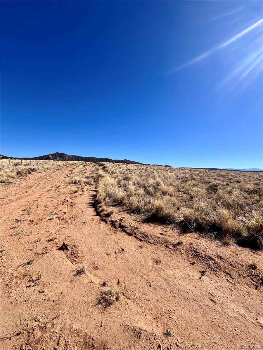 Lot 8 10th Street Blanca, CO 81123 - Photo 8 of 10 a view of ocean with a beach