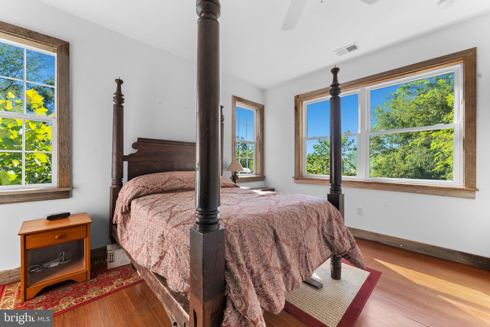 439 Rudasill Road Woodville, VA 22749 - Photo 30 of 55 Bedroom suite has four large windows.