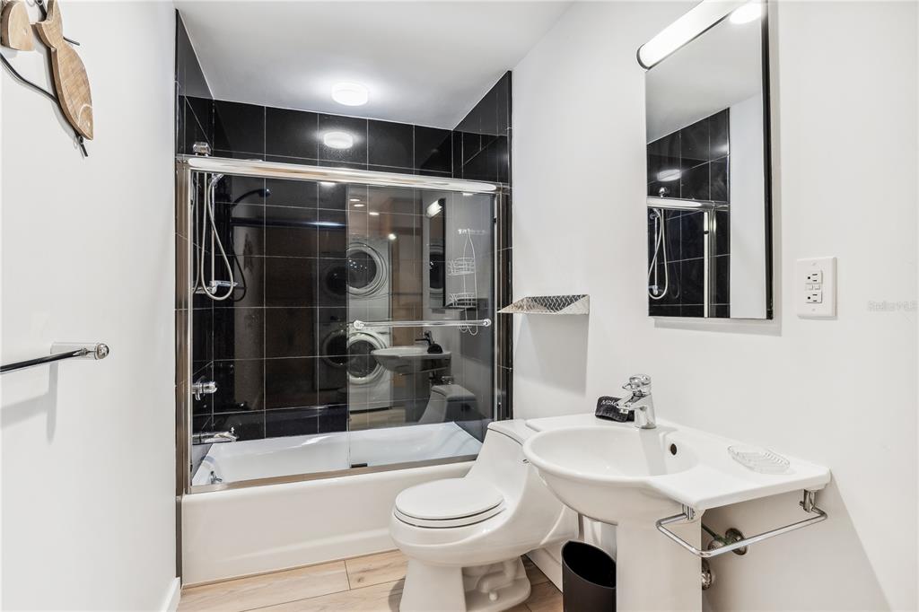 2925 Shore Lane Boca Grande, FL 33921 - Photo 20 of 25 a bathroom with a sink toilet and shower