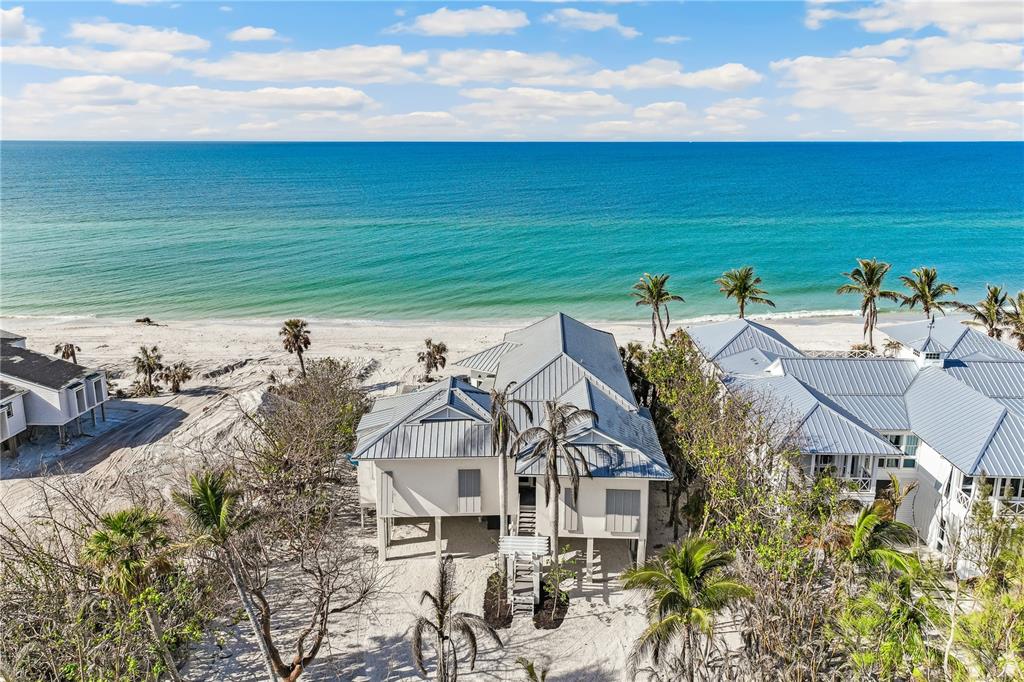 2925 Shore Lane Boca Grande, FL 33921 - Photo 2 of 25 a view of a terrace with chairs