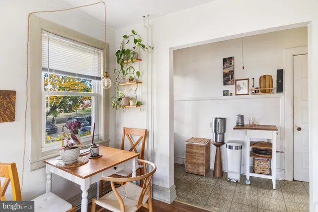 a work room with furniture and window