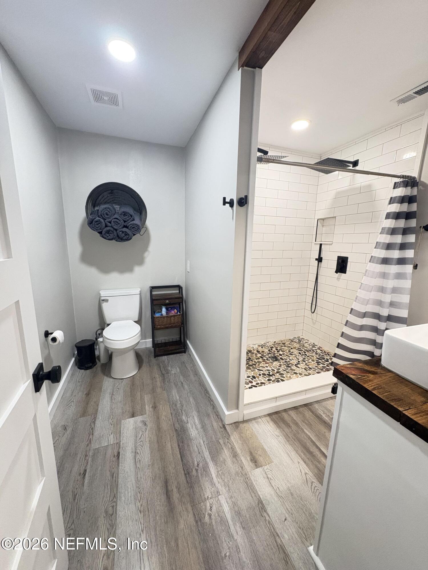 165 Fulton Road Palatka, FL 32177 - Photo 20 of 26 a bedroom with a bed and a window