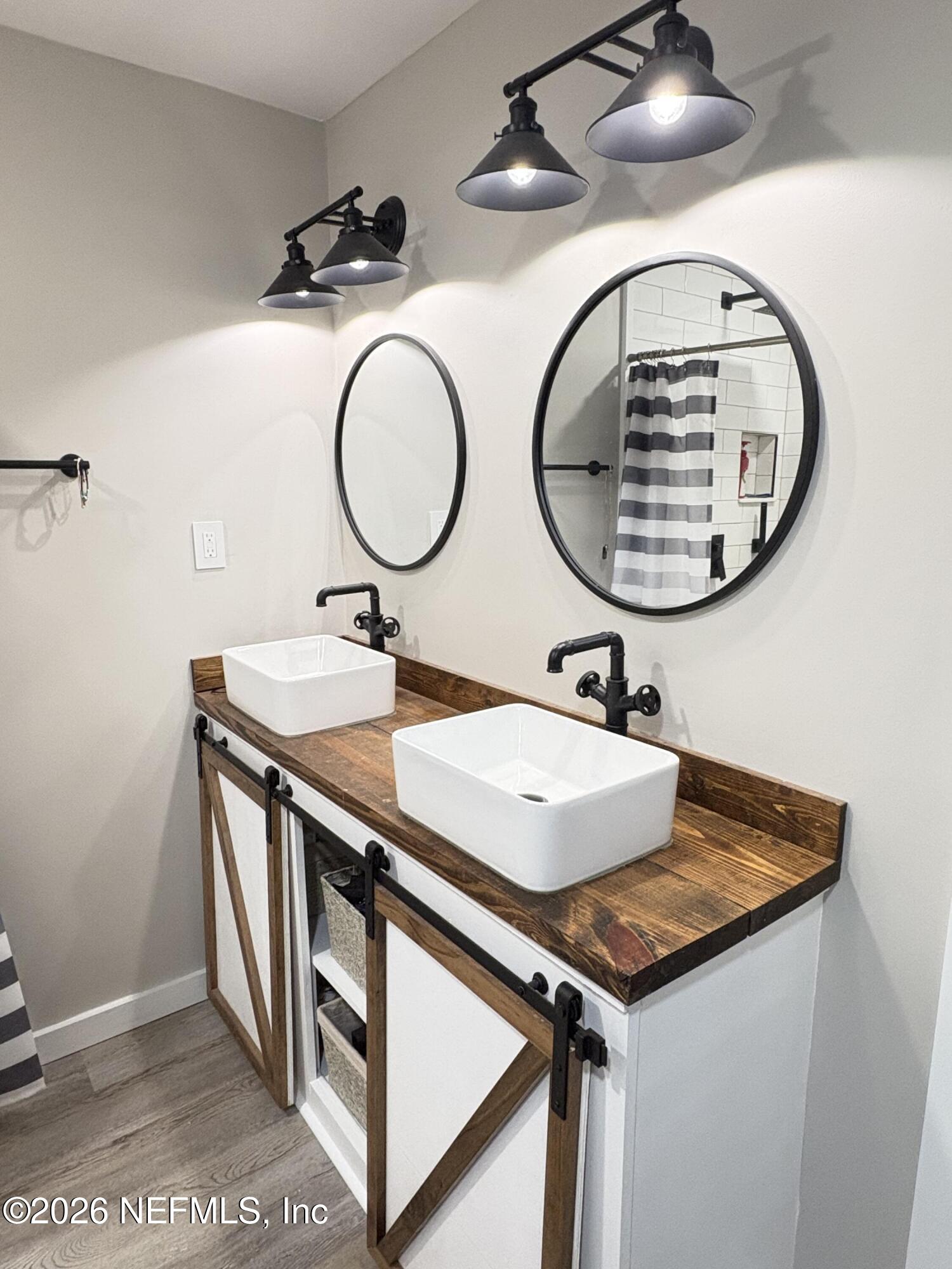 165 Fulton Road Palatka, FL 32177 - Photo 21 of 26 a bathroom with a sink and a mirror