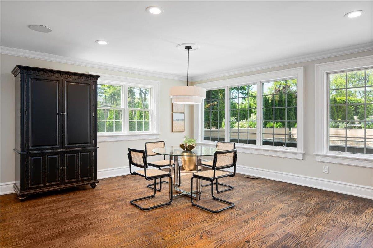 4 Clover Place New Rochelle, NY 10805 - Photo 8 of 38 a dining room with furniture window and wooden floor