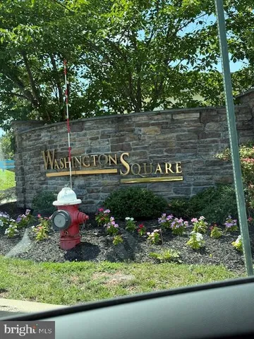 a view of a bench with fire pit