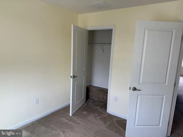 an empty room with a door