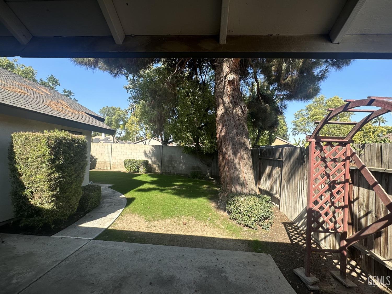 Undisclosed Address Bakersfield, CA 93313 - Photo 18 of 21 a view of a yard with plants