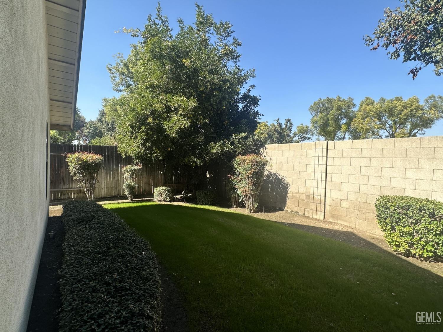 Undisclosed Address Bakersfield, CA 93313 - Photo 19 of 21 a view of a garden