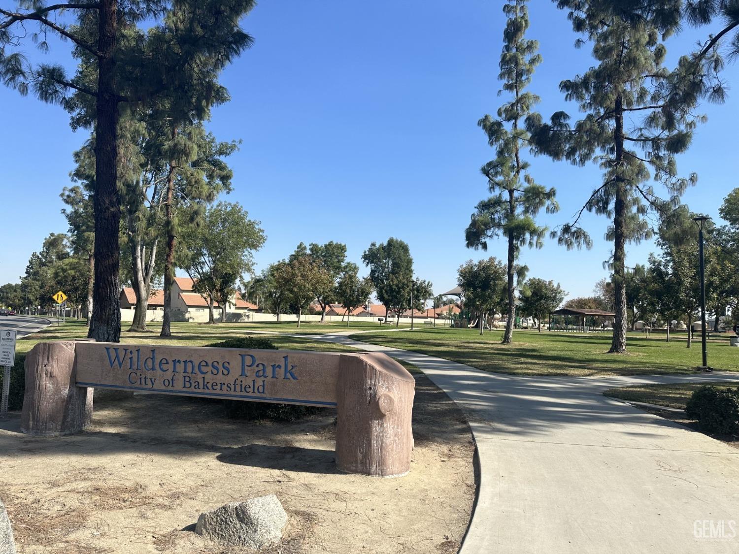 Undisclosed Address Bakersfield, CA 93313 - Photo 21 of 21 a view of a swimming pool with a patio