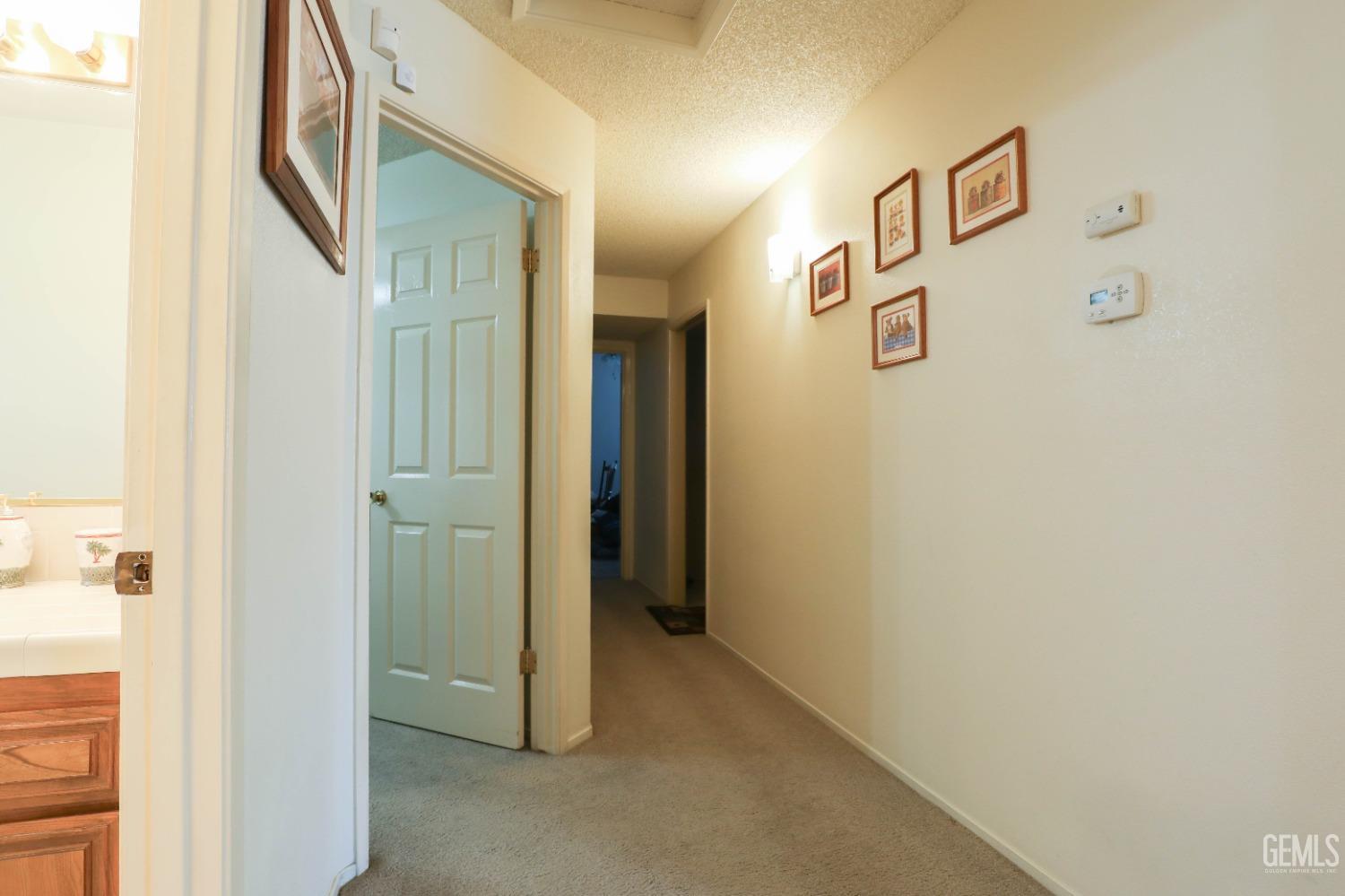 Undisclosed Address Bakersfield, CA 93313 - Photo 8 of 21 a view of a hallway with elevator