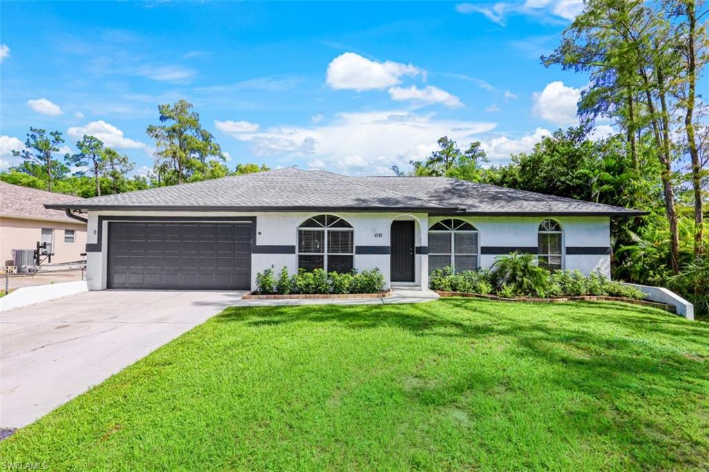 6581 Sable Ridge Lane Naples, FL 34109 - Photo 1 of 19 Front