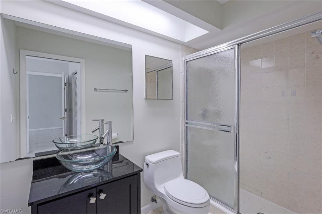 6581 Sable Ridge Lane Naples, FL 34109 - Photo 12 of 19 Bathroom 1