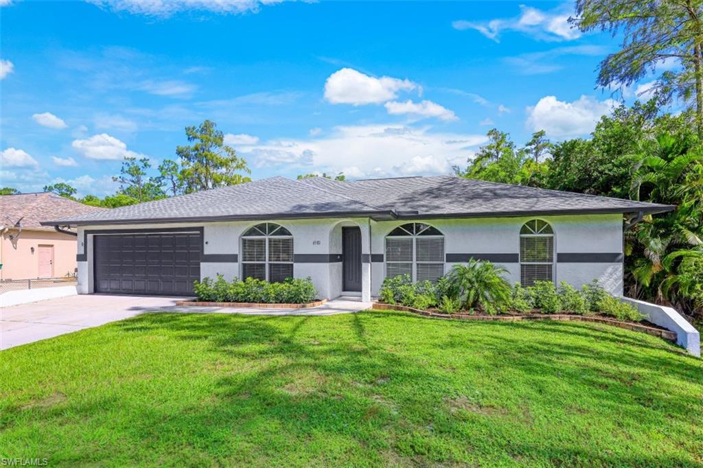6581 Sable Ridge Lane Naples, FL 34109 - Photo 2 of 19 Front