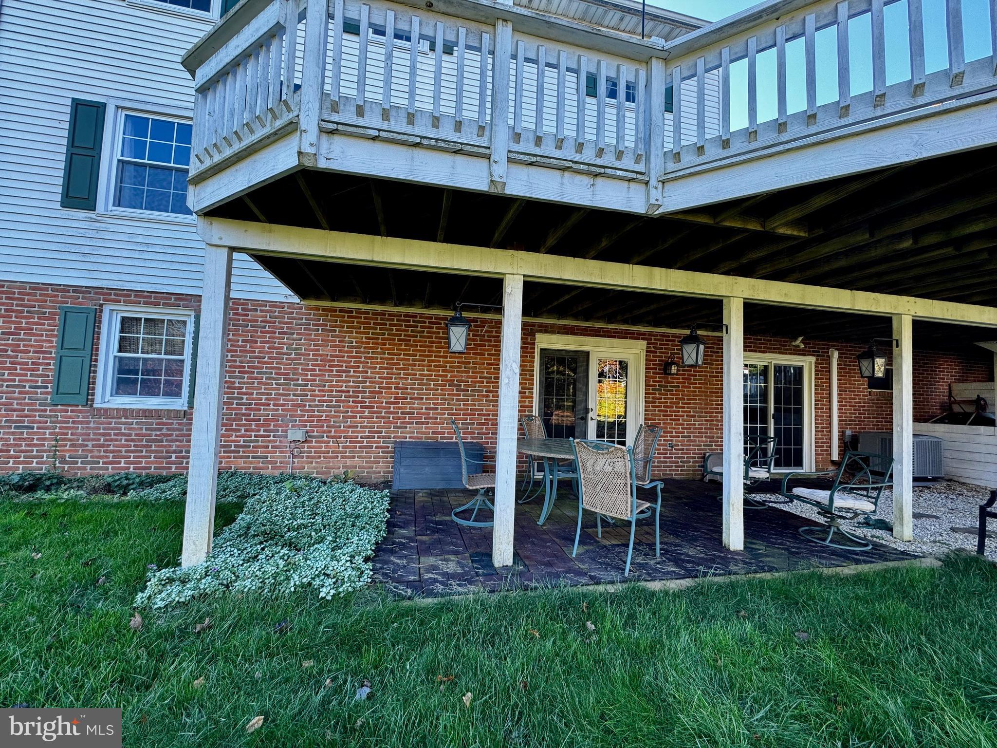 167 Walter Road York, PA 17402 - Photo 54 of 64 a view of a chair and table in backyard of the house