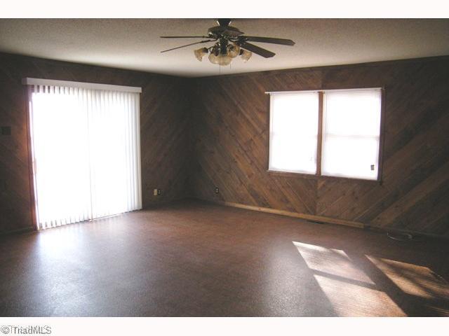 1796 Sandy Ridge Road Kernersville, NC 27284 - Photo 3 of 10 Den/Family/Great Room. Rustic, spacious family room with storage closet for plenty of fun family activities