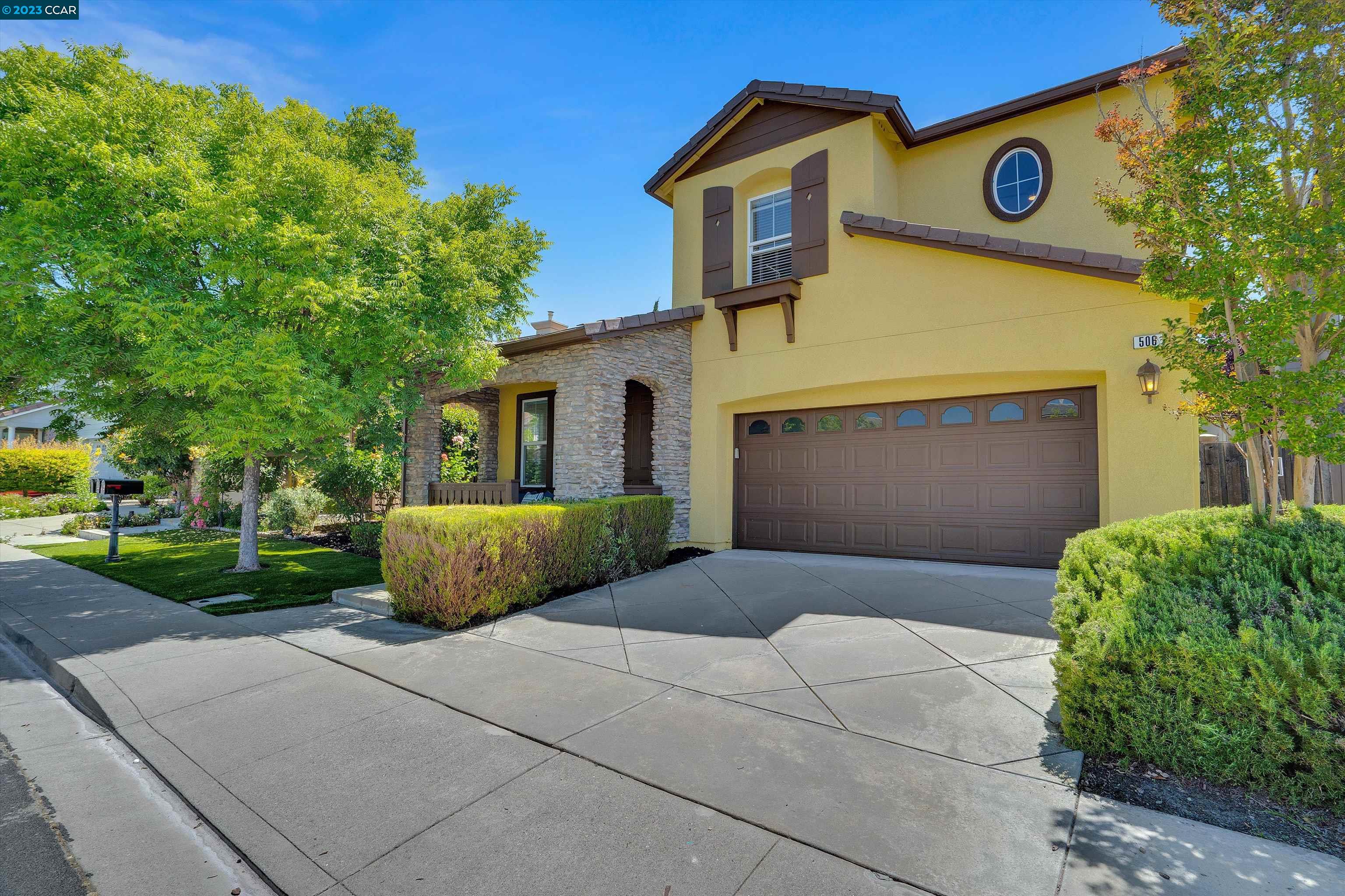 506 Adriatic Court San Ramon, CA 94582 - Photo 1 of 1 a front view of a house with a garden and plants