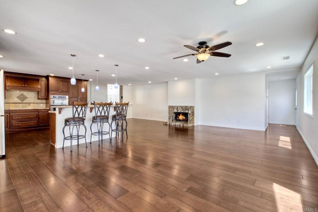 13815 Hilldale Road Valley Center, CA 92082 - Photo 11 of 50 a view of a kitchen and dining room with wooden floor