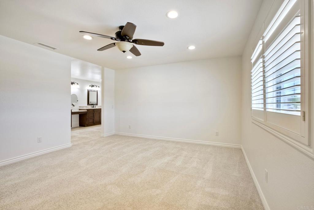 13815 Hilldale Road Valley Center, CA 92082 - Photo 20 of 50 wooden floor in an empty room with a window