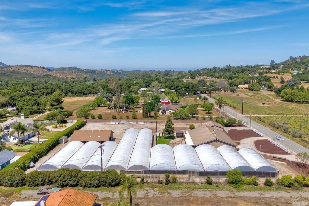 13815 Hilldale Road Valley Center, CA 92082 - Photo 40 of 50 an aerial view of residential houses with outdoor space and river