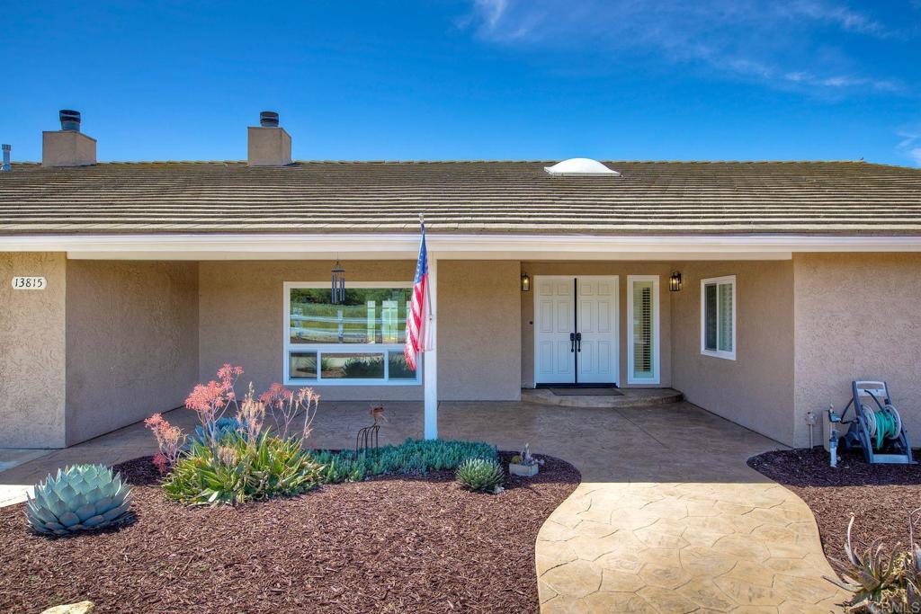 13815 Hilldale Road Valley Center, CA 92082 - Photo 4 of 50 a view of a house with a porch