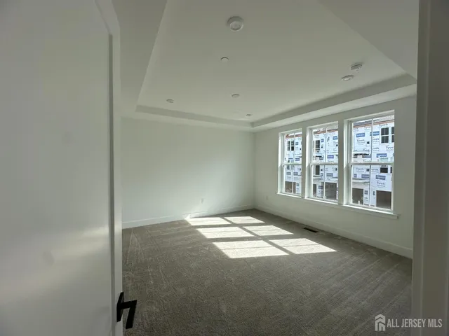a bathroom with a double vanity sink mirror and shower