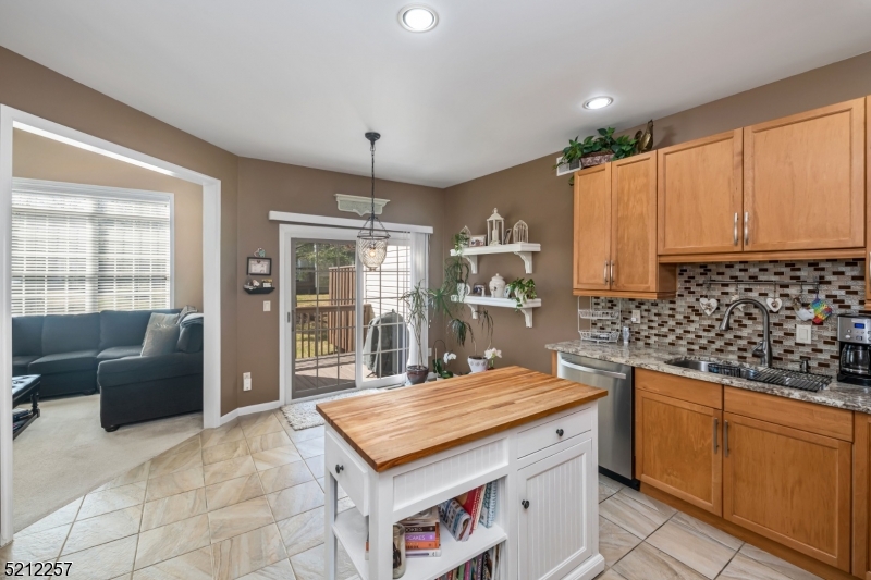 9 O'Connor Circle West Orange, NJ 07052 - Photo 13 of 29 a kitchen with stainless steel appliances granite countertop a stove and a sink