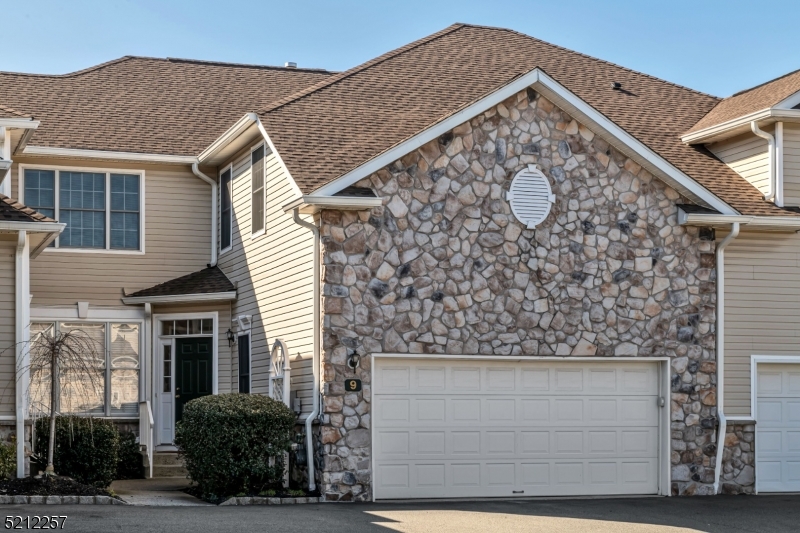9 O'Connor Circle West Orange, NJ 07052 - Photo 2 of 29 a front view of a house with garden