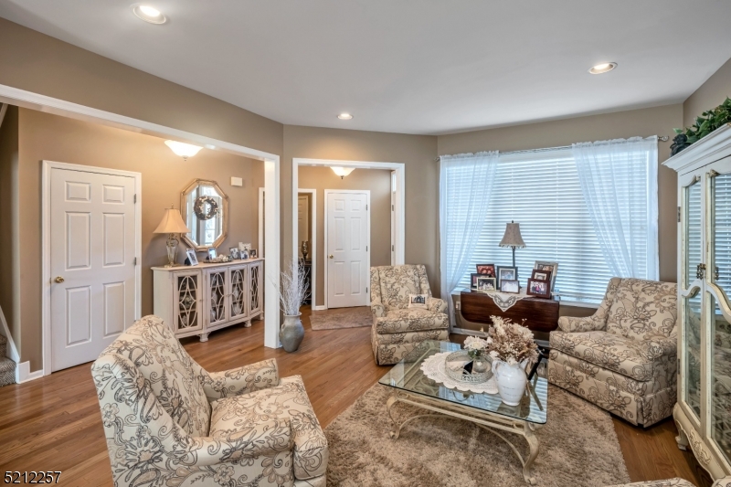 9 O'Connor Circle West Orange, NJ 07052 - Photo 7 of 29 a living room with furniture and a large window