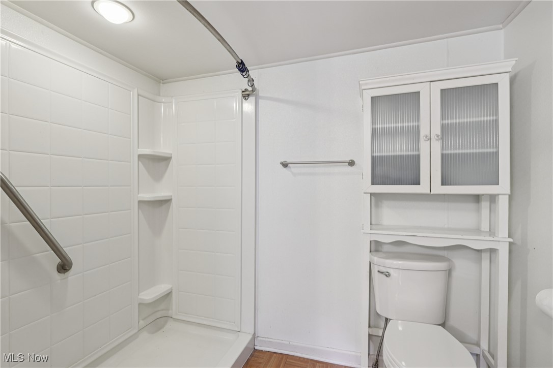 1674 Betz Road Akron, OH 44306 - Photo 16 of 29 Full bathroom with large walk-in shower and commode