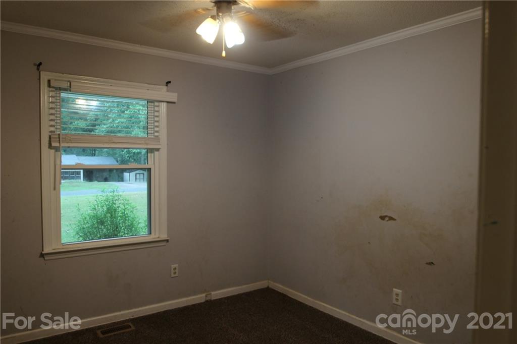 755 Shady Forest Road Clover, SC 29710 - Photo 8 of 12 an empty room with a window