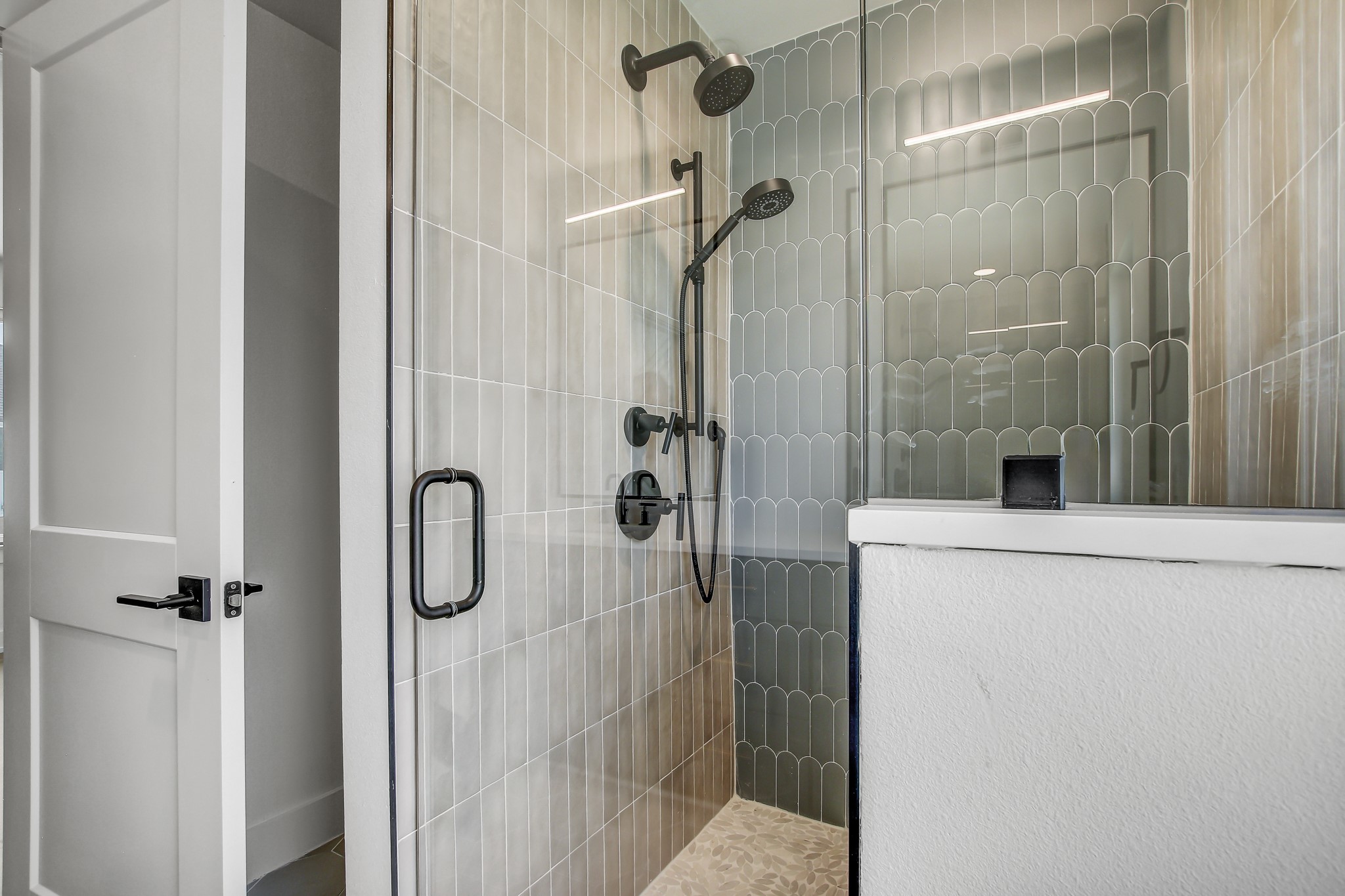 4127 East 12th Street, Unit 5 Austin, TX 78721 - Photo 10 of 33 Full bath with tiled shower