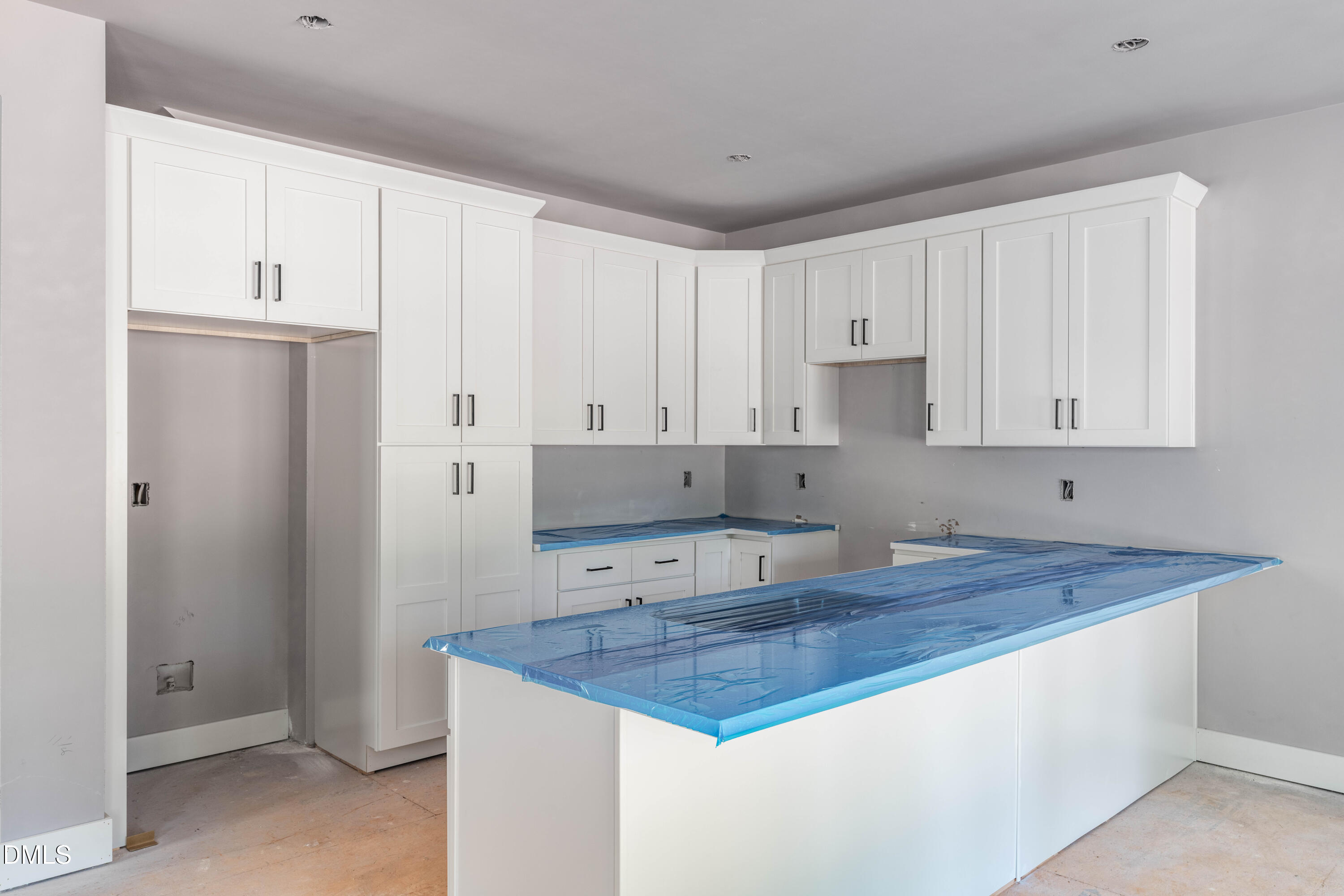 1032 Harper Road Raleigh, NC 27603 - Photo 9 of 62 a kitchen with stainless steel appliances granite countertop a refrigerator sink and white cabinets