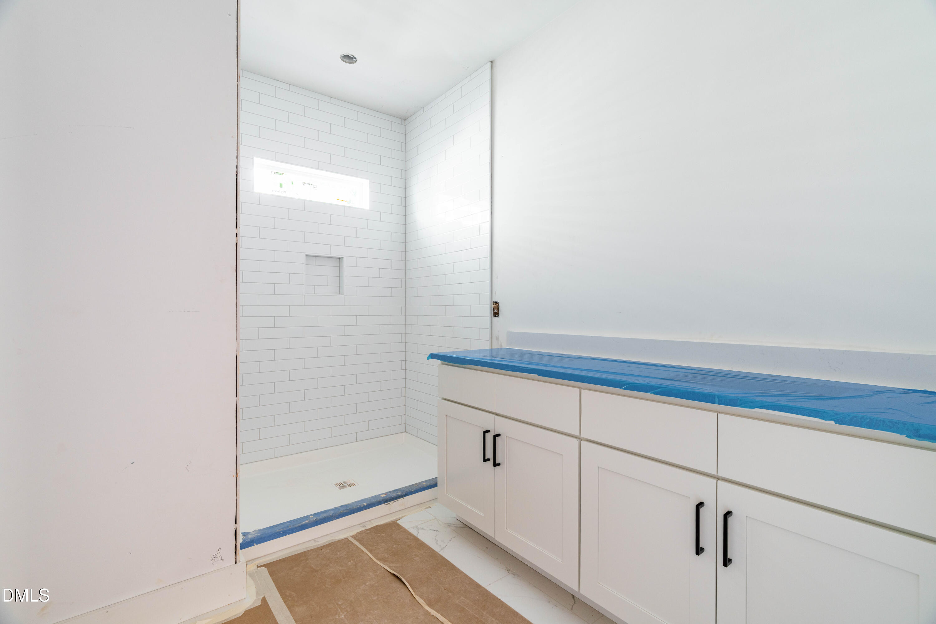 1032 Harper Road Raleigh, NC 27603 - Photo 14 of 62 a bathroom with a shower