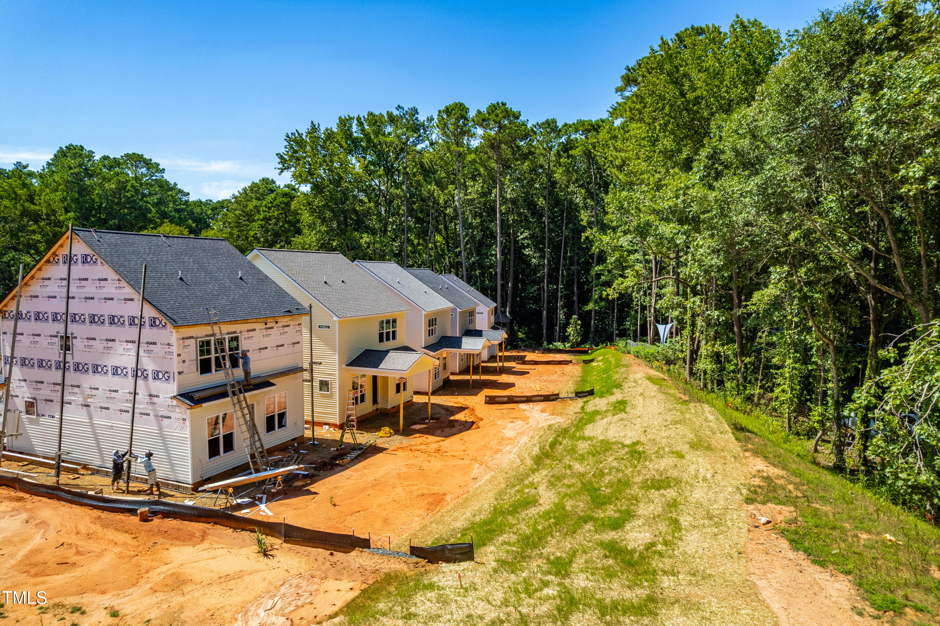 1032 Harper Road Raleigh, NC 27603 - Photo 47 of 62 a view of a house with pool and sitting area