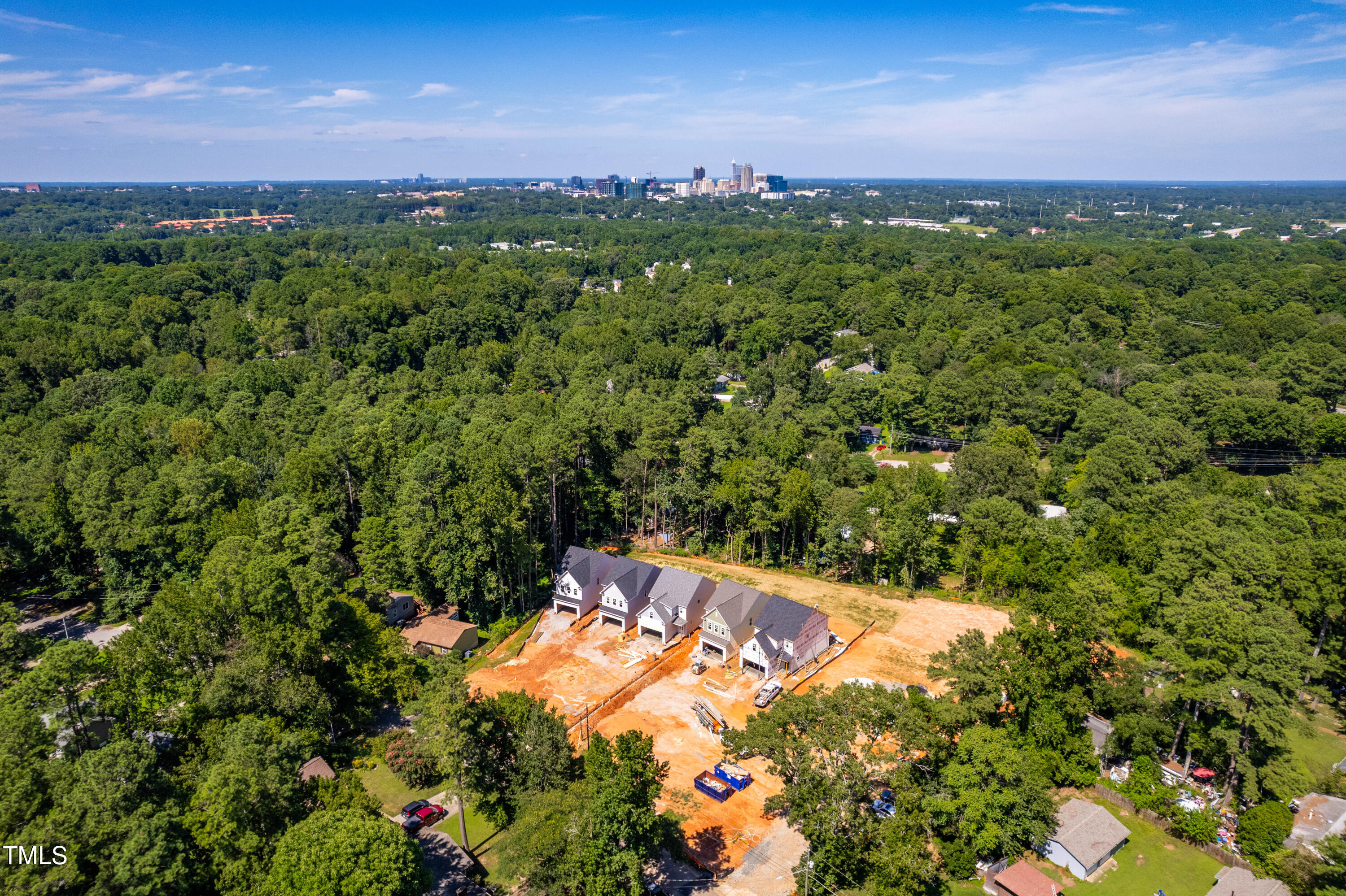 1032 Harper Road Raleigh, NC 27603 - Photo 48 of 62 a view of a city with lush green forest