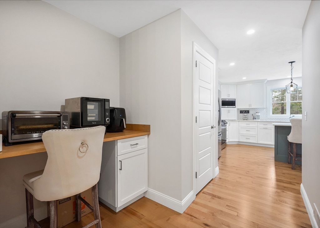 61 New Boston Road Sturbridge, MA 01566 - Photo 16 of 42 a view of kitchen with cabinets and wooden floor