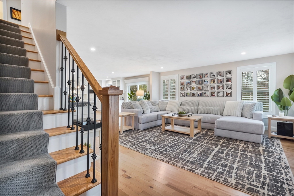 61 New Boston Road Sturbridge, MA 01566 - Photo 24 of 42 a living room with furniture or stairs and a couch