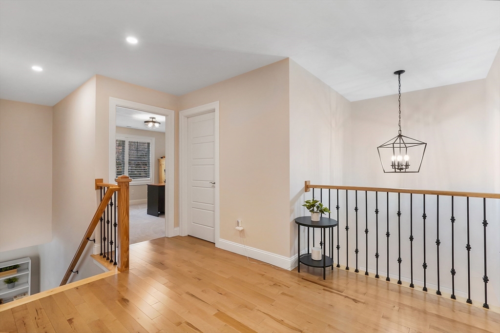 61 New Boston Road Sturbridge, MA 01566 - Photo 25 of 42 a view of a hallway with a livingroom