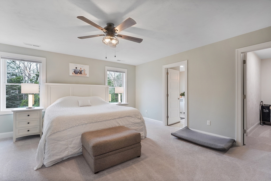 61 New Boston Road Sturbridge, MA 01566 - Photo 26 of 42 a spacious bedroom with a bed and window