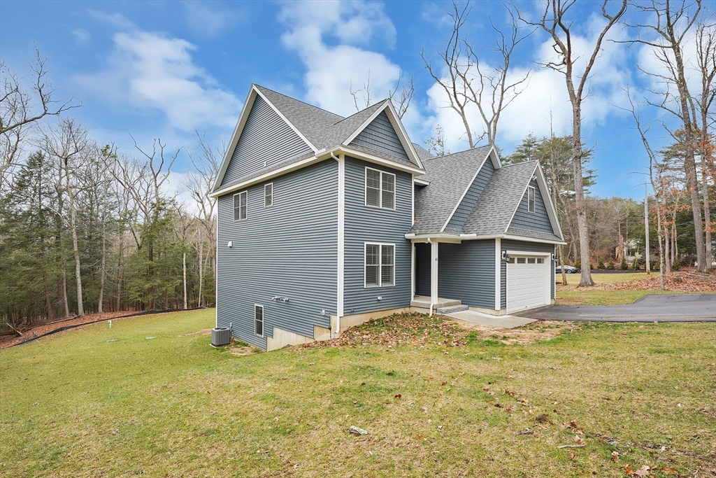 61 New Boston Road Sturbridge, MA 01566 - Photo 3 of 42 a view of a house with a yard