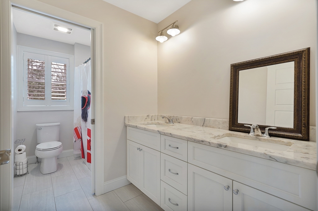 61 New Boston Road Sturbridge, MA 01566 - Photo 31 of 42 a bathroom with a sink and a mirror
