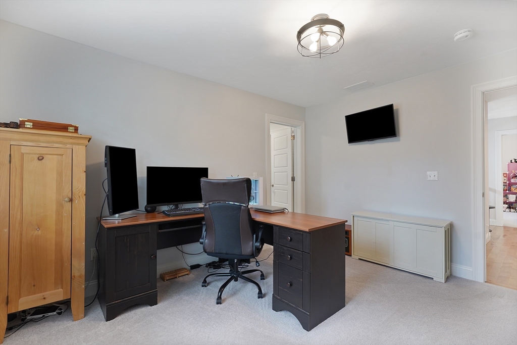 61 New Boston Road Sturbridge, MA 01566 - Photo 34 of 42 a view of a workspace with furniture and a window