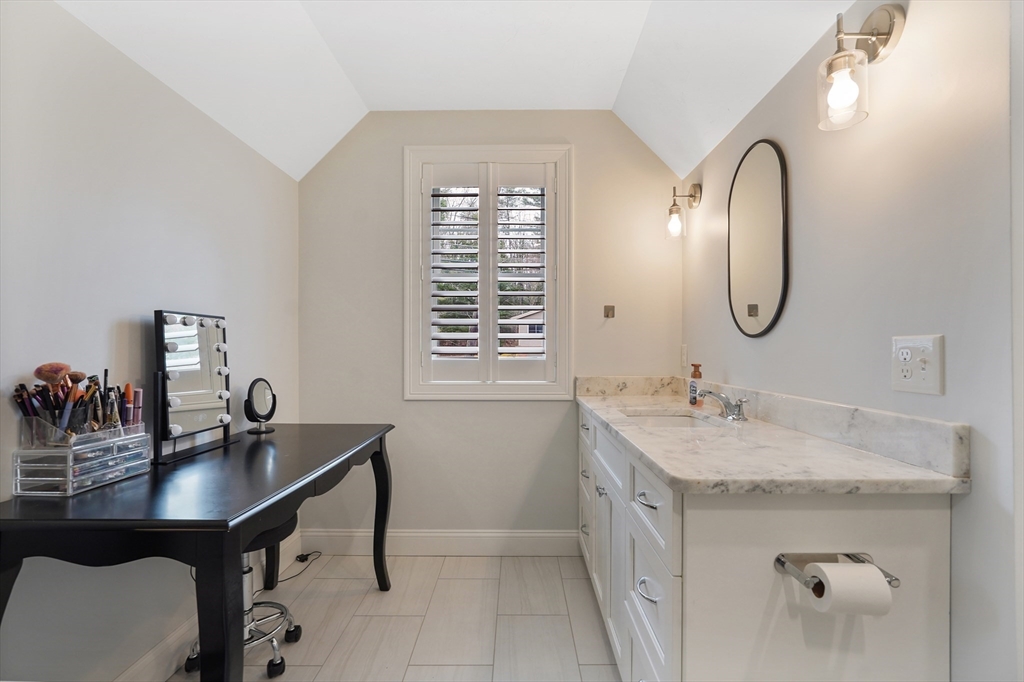 61 New Boston Road Sturbridge, MA 01566 - Photo 36 of 42 a bathroom with a granite countertop sink a toilet and a mirror