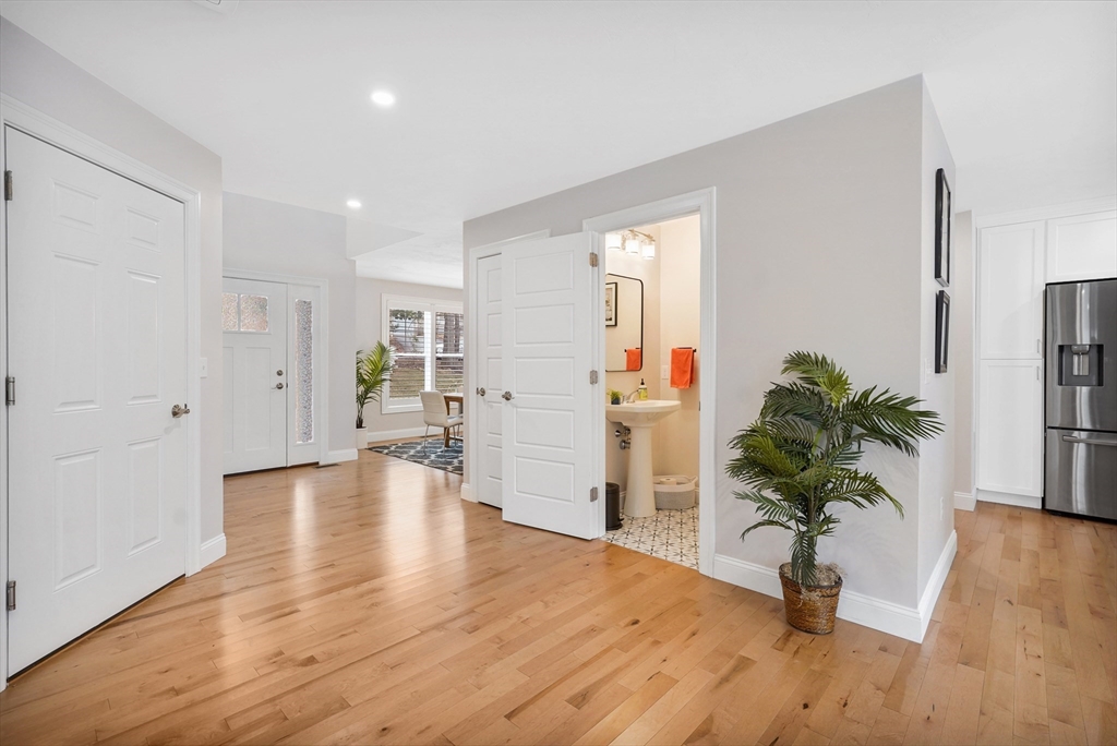 61 New Boston Road Sturbridge, MA 01566 - Photo 8 of 42 a living room with furniture and a potted plant