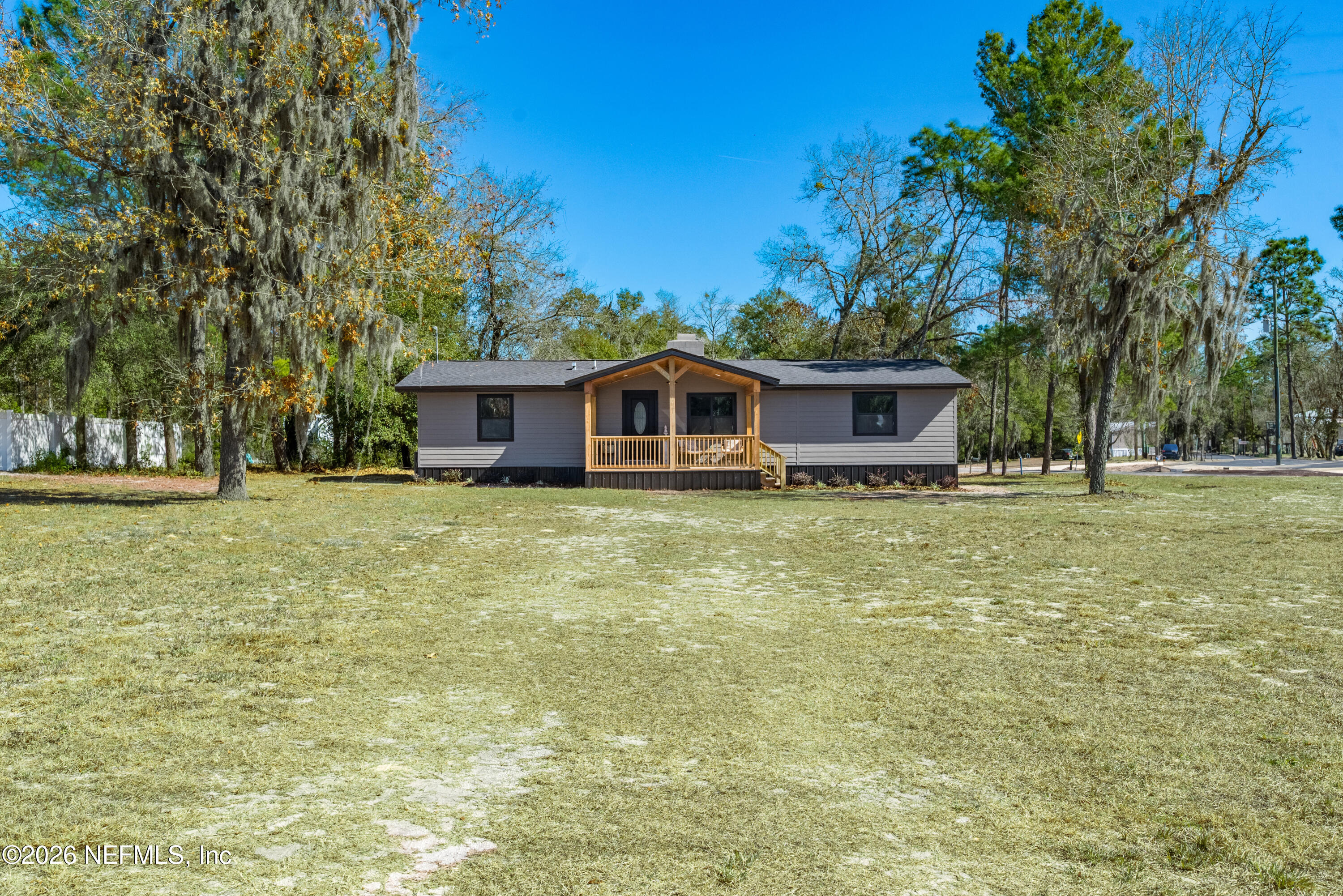 4193 Southeast 8th Avenue Keystone Heights, FL 32656 - Photo 3 of 53 a front view of a house with a garden