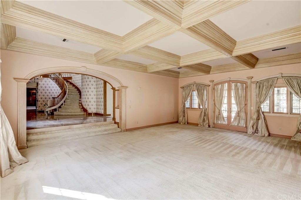 1632 Smiley Heights Drive Redlands, CA 92373 - Photo 13 of 75 a view of a livingroom with window and stairs