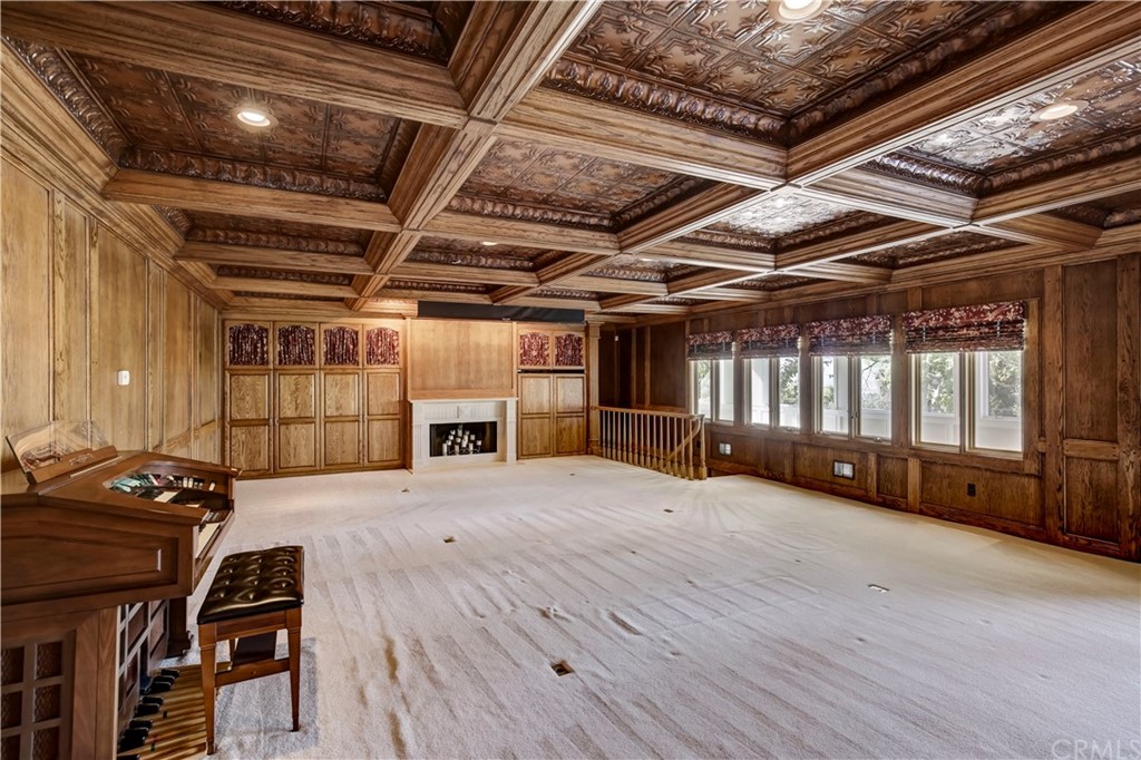 1632 Smiley Heights Drive Redlands, CA 92373 - Photo 22 of 75 a view of an empty room with wooden floor