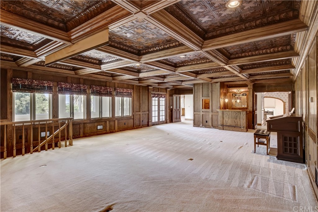 1632 Smiley Heights Drive Redlands, CA 92373 - Photo 23 of 75 a view of an empty room with wooden floor