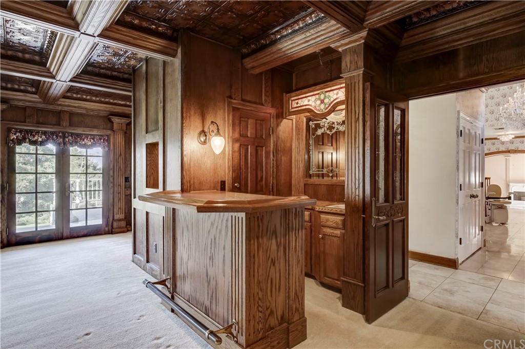 1632 Smiley Heights Drive Redlands, CA 92373 - Photo 24 of 75 a view of a hallway with wooden shelves