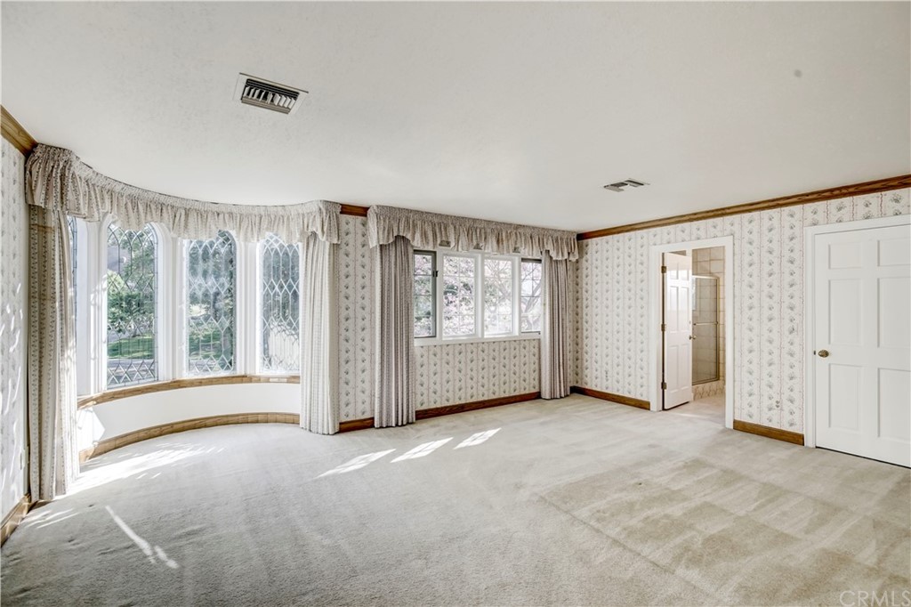 1632 Smiley Heights Drive Redlands, CA 92373 - Photo 30 of 75 a view of an empty room with a window